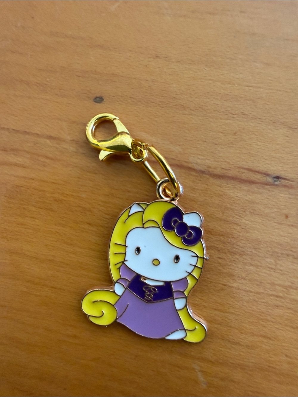 ‼️2/$10‼️Sanrio Hello Kitty Enamel Charm in Purple and Yellow with Gold Hardware